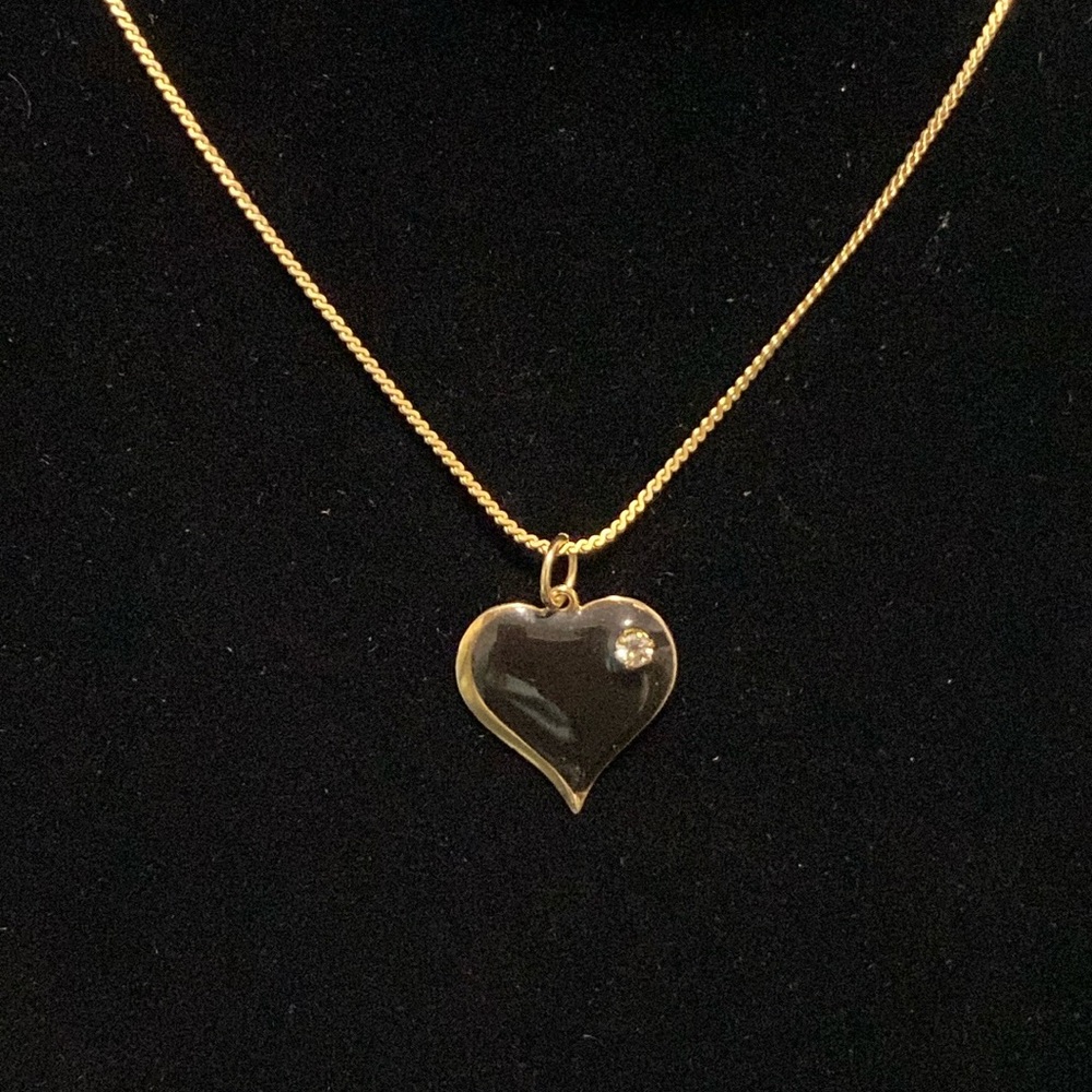 Black enamel and crystal heart necklace, comes with chain.